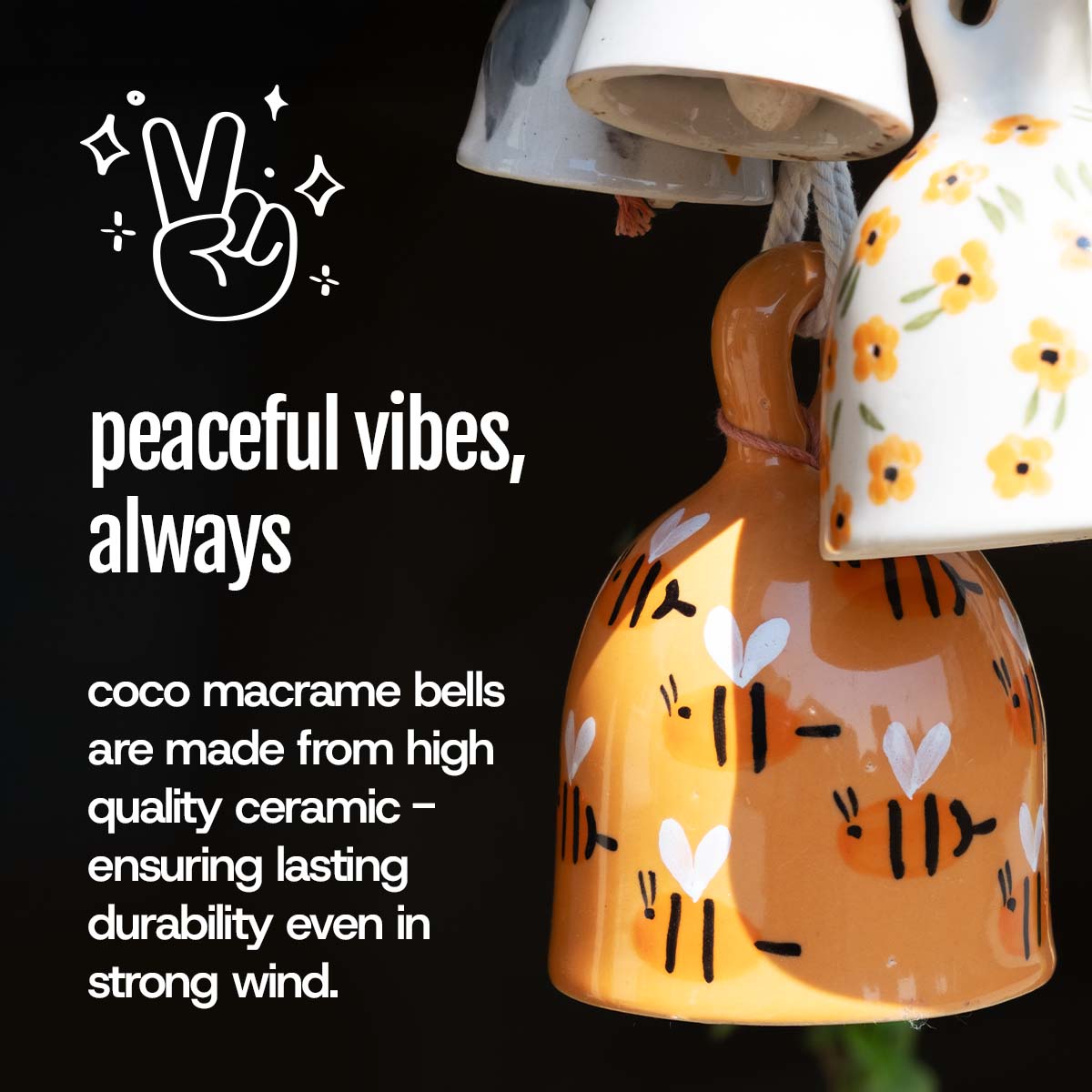 Ceramic bells with floral patterns on a black background, featuring text about their durability.